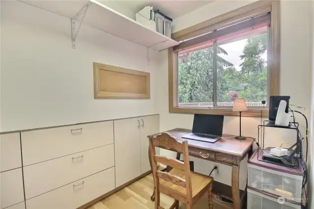 An office off the kitchen, or great storage.