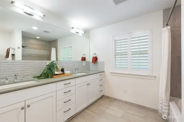 Primary bathroom with double vanity.