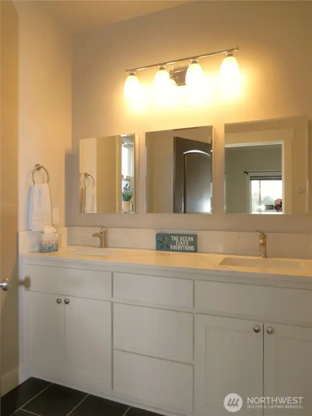 HOME CONTINUES WITH WHITE VANITY DOUBLE SINK WITH GRANITE COUNTER TOP AND DESIGNER LIGHTING!