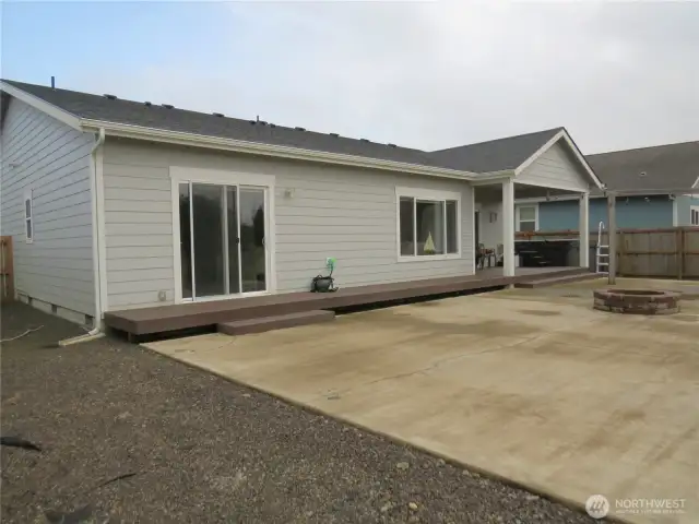 VIEW OF THE BACK OF THE HOME PATIO AND EASY CARE YARD!