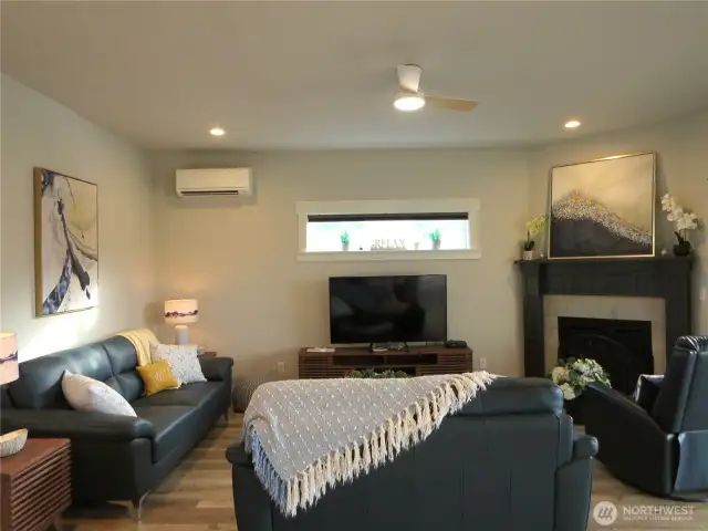 ENTERTAIN IN THE GREAT ROOM AND TAKE ADVANTAGE OF THE MINI-SPLIT HEATING AND COOLING SYSTEM!