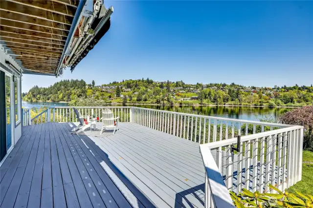 Motorized awnings installed for a shady retreat on a hot day. Multiple decks to enjoy the space & view.