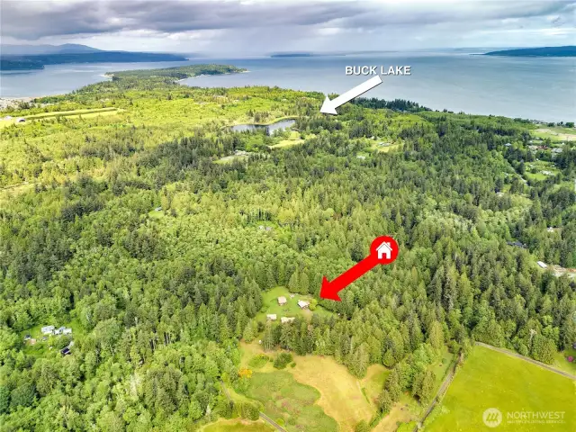 20 Acres just south of Buck Lake and Hansville proper.  At the top of the photo Foulweather Bluff is dividing the Salish Sea into Hood Canal to the west (left) and Puget Sound to the east.