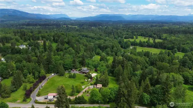 This shy 10 acre property has it all, views, barn, shop, sport court and subdividable.