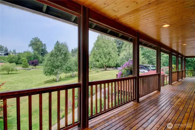 The wraparound porch wraps half of the main level and offers plenty of space for seating.  It was just re-stained.