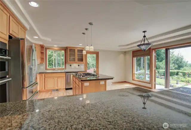 Open concept kitchen looks out onto the patio.