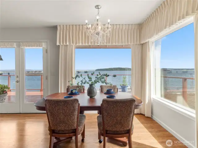 Surrounded by water views as you enjoy dinner. French doors open up to your large deck, optimal for indoor/outdoor living.