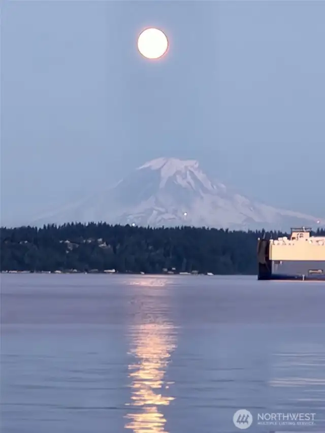 Moon rising over Mt. Rainier. Enjoy this view from your deck, living room, and bedrooms.