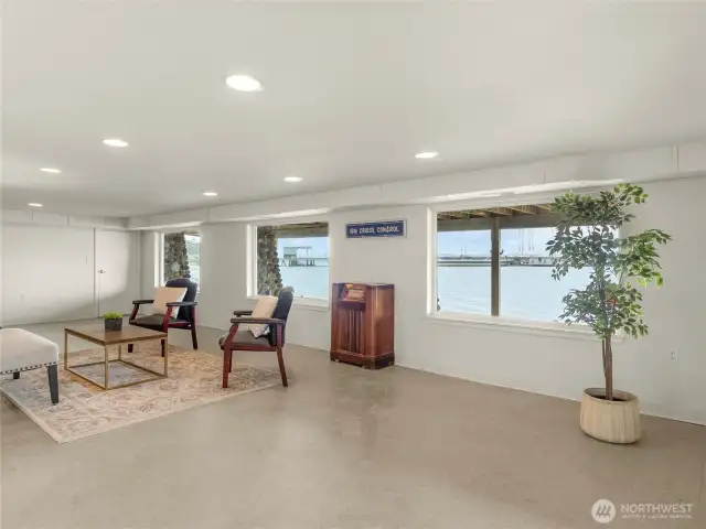 Large, bright finished basement has loads of potential- an extra room, 3/4 bathroom, additional washer/dryer hookup, and separate entrance could potentially be transformed into a MIL or income producing space with some vision. French doors open to a covered patio where you can unwind and relax in a hanging hammock as the gently crashing waves rock you to sleep.