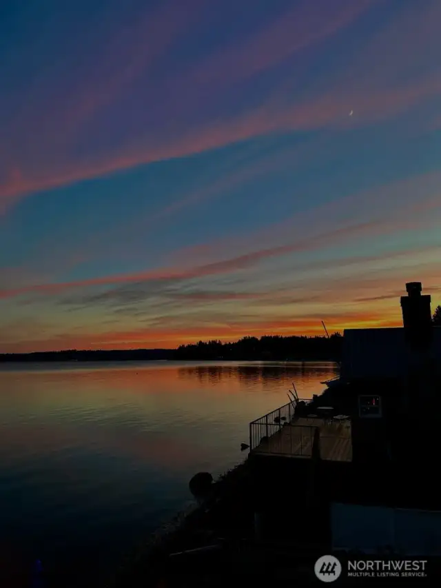 Sherbet skies reflecting in the water. The calm this photo brings... priceless.