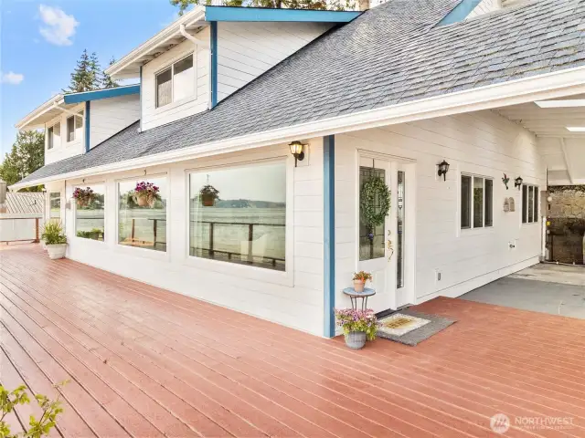 Covered entry area leads to the large attached carport that can easily fit four cars (two wide, two deep). With even more space for parking in the driveway.