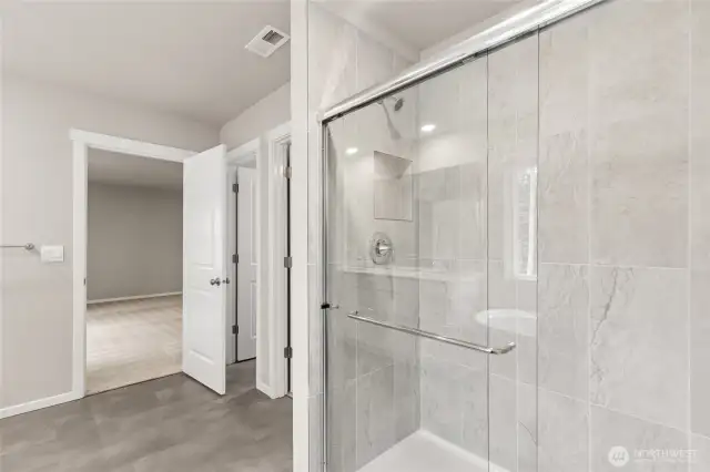 Marble shower surround.Photo's are for representational purposes only. Colors and finishes may differ.