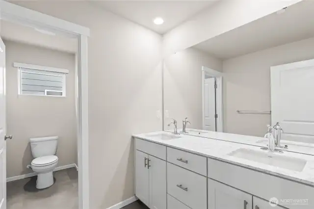 Main bath on 2nd floor with convenient separation.  Photo's are for representational purposes only. Colors and finishes may differ.