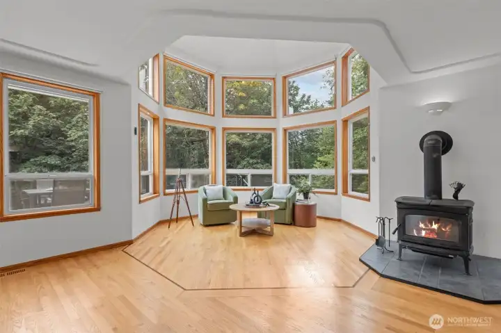 Two large turret rooms make this space feel grand plus allow for amazing natural light and compliment the tranquil backdrop of the property.