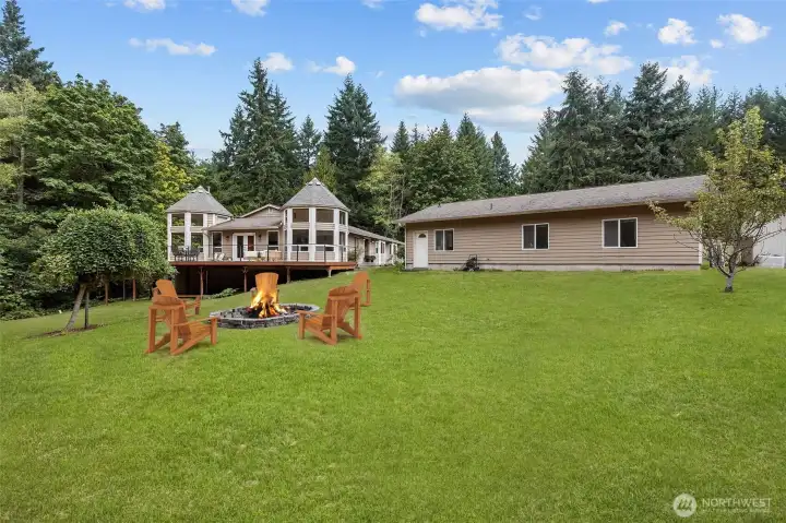 Back yard with fire pit. ADU has back door giving direct access to yard!