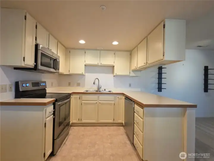 Well cared-for cabinets have been professionally repainted.