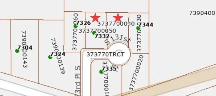 TWO adjacent lots, offering a rare opportunity for space, privacy, and future flexibility.