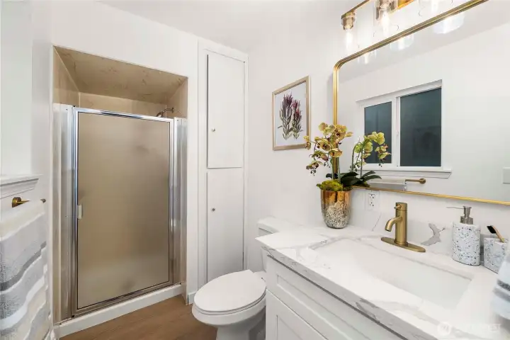 Private master bathroom with walk-in shower.