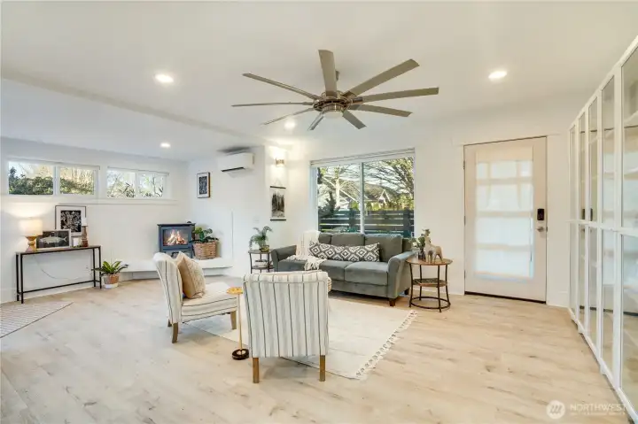 Recent updates include some fresh paint, new window coverings, a ductless heat pump for efficient heating and cooling, and convenient wall-mounted storage.