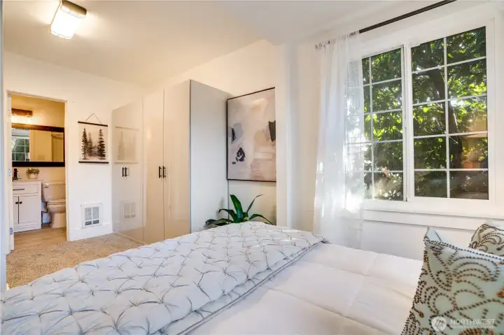 An attached three-quarter bath completes the primary suite.