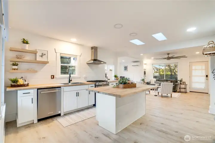 Let's head out to the backyard! With the kitchen so conveniently located near the back door, entertaining will be a breeze!