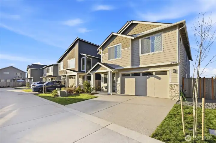 Better than new construction with all the high end window coverings and landscaping installed.