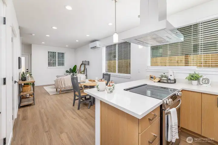 Island bar offers extra seating options. **staged unit B**