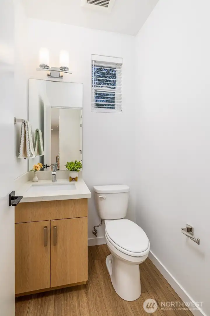 Main floor powder room. **staged unit B**