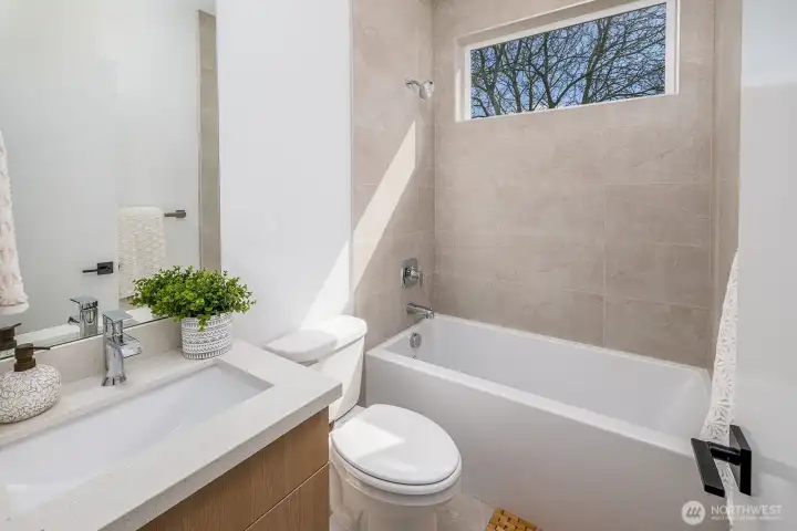 Second top floor full bathroom off of hallway. **staged unit B**