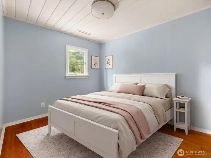 The home has two rooms, 1 is a bedroom with a closet, the other is a den/office, no closet.  The two room sizes are 9'9" x 11'7" and 8'6" x 11' x 7".  This is virtually staged.