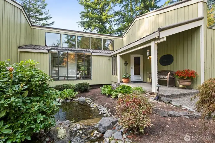 Front entry fountain and pond.