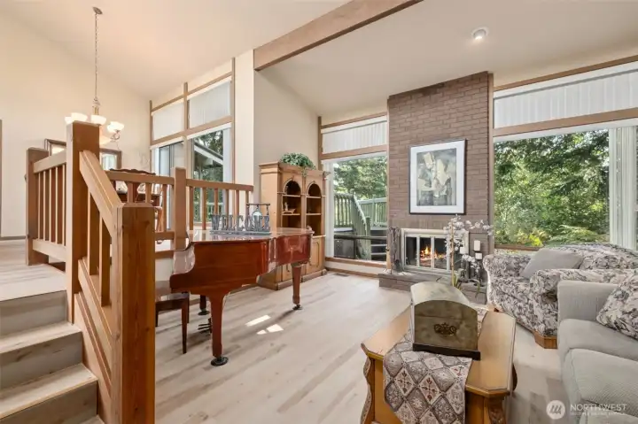 Vaulted ceilings allow for spacious feeling in living room and dining room.