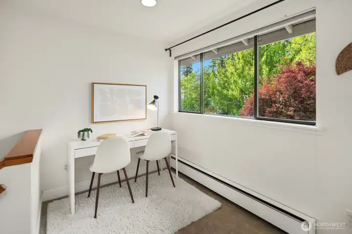 Office nook overlooking the mature landscaping.