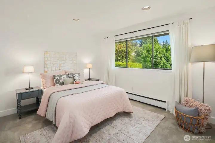 Second upstairs bedroom also looking toward the backyard.