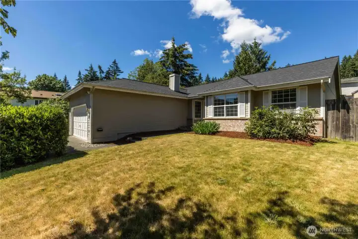 Enjoy the huge front yard! Established gardens will bring you joy all summer.