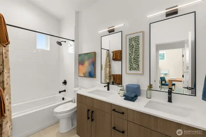 Another shared bathroom! Photo is of model home of same floorplan. Color schemes and finishes will vary per plan. Another shared bathroom! Photo is of model home of same floorplan. Color schemes and finishes will vary per plan.