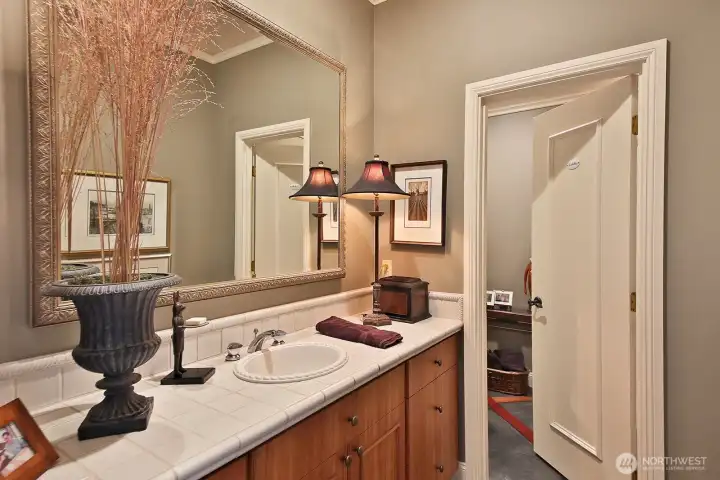 Downstairs 3/4 bath has a shower and doubles as a guest bath. Downstairs 3/4 bath has a shower and doubles as a guest bath.