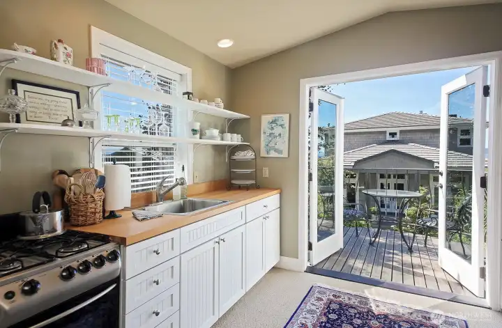 Guest Kitchen with French doors to the balcony. Guest Kitchen with French doors to the balcony.