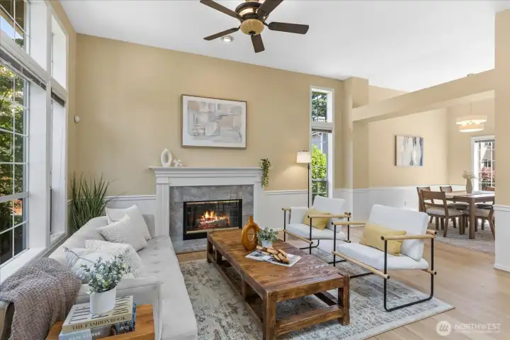 Living Room with gas fireplace and vaulted ceilings as you enter the home.