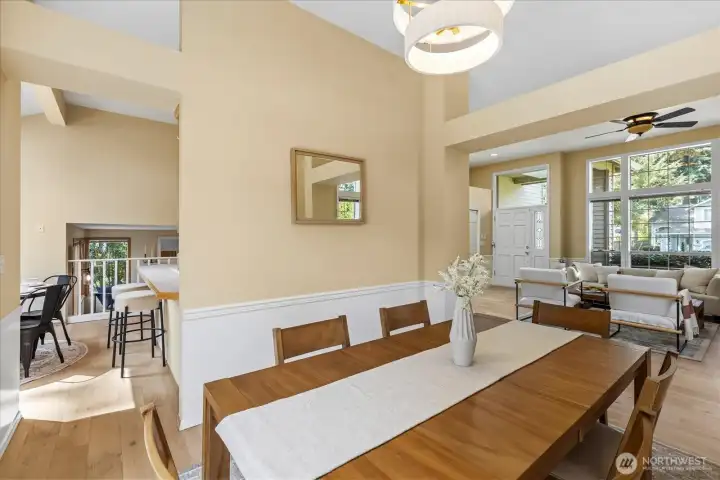 The dining room opens to both the living room and kitchen for convenience.