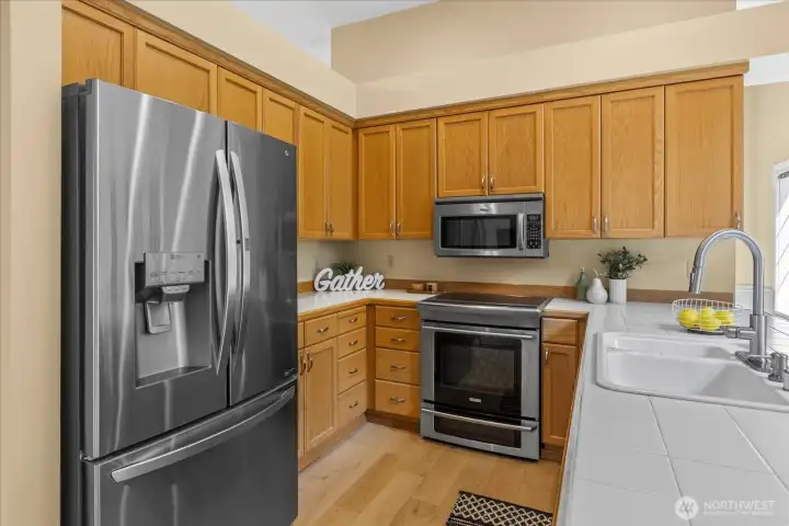 Stainless steel appliances in the kitchen.