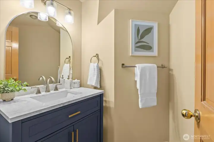Powder room off the family room on the lower level.