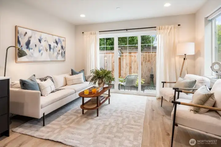 Entertaining friends is a piece of cake with this charming living room with southern natural light. Entertaining friends is a piece of cake with this charming living room with southern natural light.