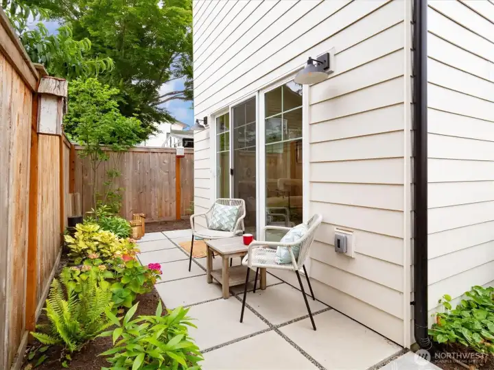 The fully fenced back garden has patio pavers to create a welcome retreat on summer days. The fully fenced back garden has patio pavers to create a welcome retreat on summer days.