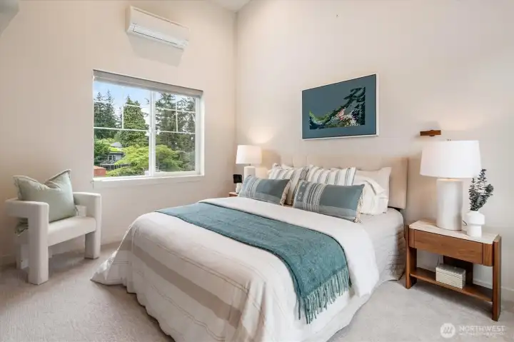 Featuring vaulted ceilings and stunning territorial views the primary en-suite bedroom is wonderful. Featuring vaulted ceilings and stunning territorial views the primary en-suite bedroom is wonderful.