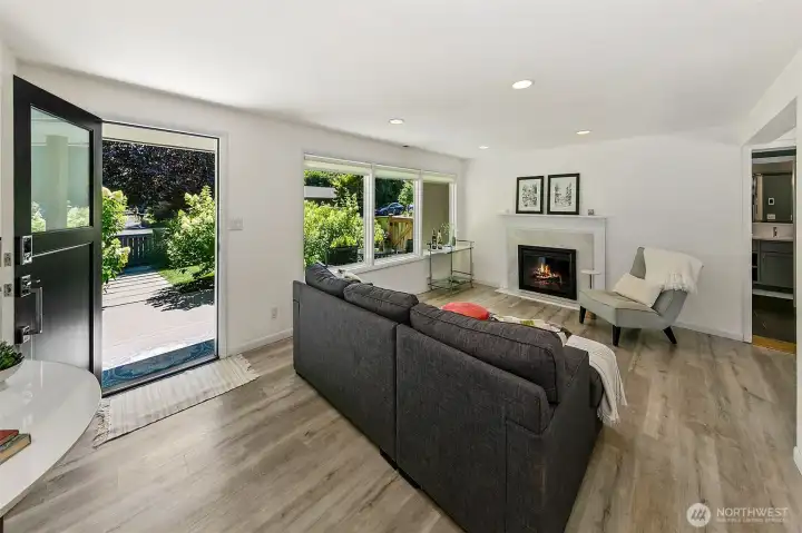 The reconfigured living room offers easy one-level circulation, garden outlooks and direct access to outdoor living. The reconfigured living room offers easy one-level circulation, garden outlooks and direct access to outdoor living.