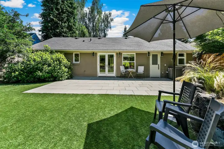 A generous terrace, low-maintenance turf and fully fenced grounds provide exceptional space for dining, lounging and outdoor gatherings. A generous terrace, low-maintenance turf and fully fenced grounds provide exceptional space for dining, lounging and outdoor gatherings.