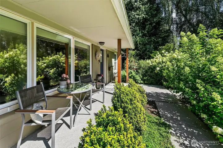 Covered outdoor living surrounded by established plantings, seasonal color and the privacy of a garden that has matured over time. Covered outdoor living surrounded by established plantings, seasonal color and the privacy of a garden that has matured over time.