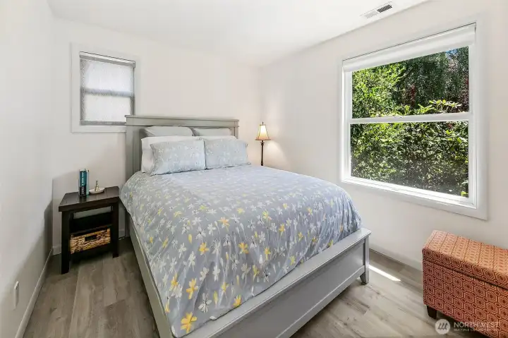 Flexible east bedroom or home office with broadband connectivity, a lighted closet, roller blinds and a leafy, private outlook. Flexible east bedroom or home office with broadband connectivity, a lighted closet, roller blinds and a leafy, private outlook.