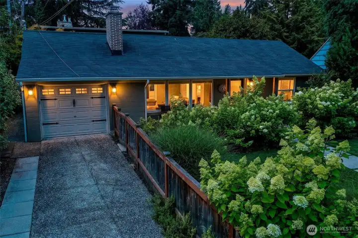 The covered entry and illuminated approach create a welcoming arrival, supported by keyless access and automatic exterior lighting. The covered entry and illuminated approach create a welcoming arrival, supported by keyless access and automatic exterior lighting.